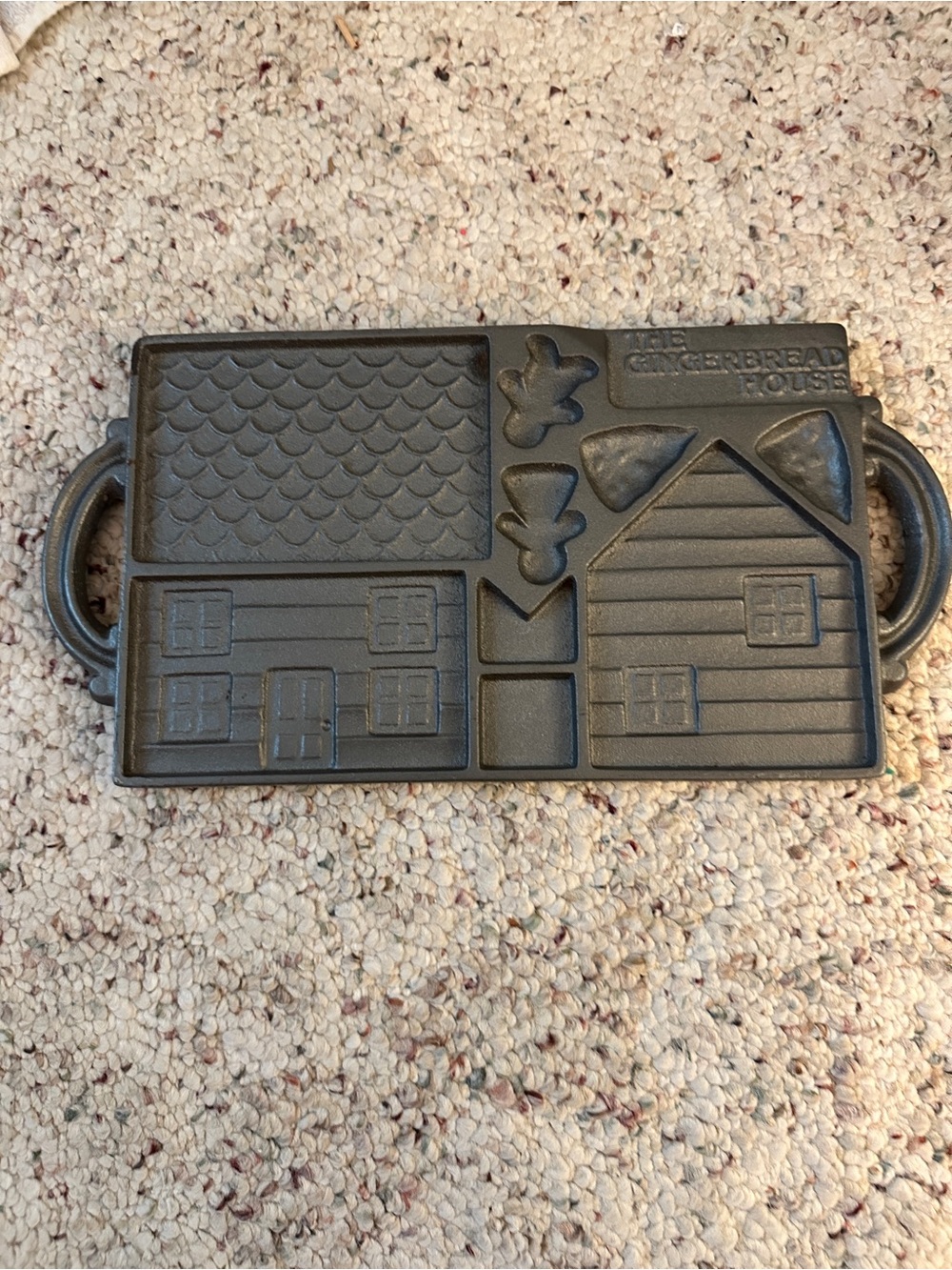 vintage 1985 John Wright cast iron gingerbread house baking mold.